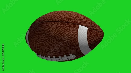 American football rotating on a green screen