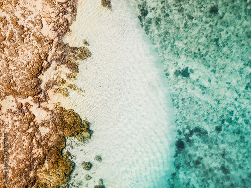 Tropical Summer with Natural Marine and Blue Background with Sunbeams. Sea and Ocean Beach with Tropical Sand. Copy Space, Summer Vacation Concept. White Background and Beautiful Splashes, 2020