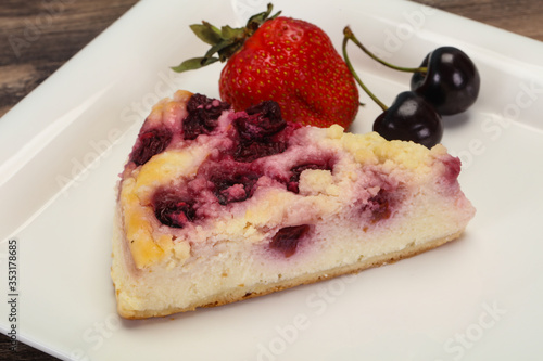 Cheesecake with cherry served strawberry