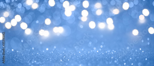 Christmas and New Year holidays glitter bokeh background © Guschenkova