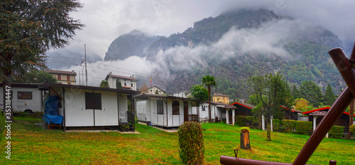 Lake Como and mountains in the fog photo