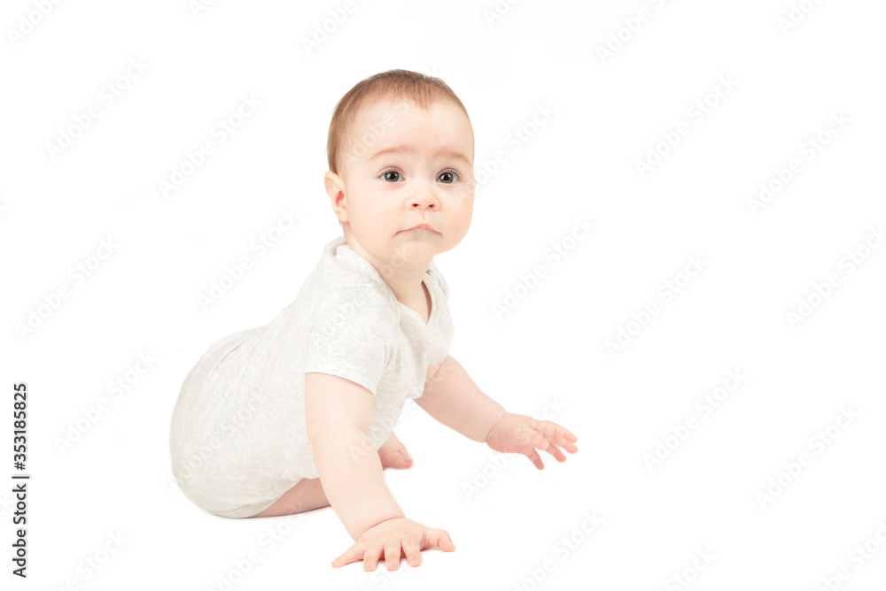 Happy child is sitting on floor isolated on white background Happy child is sitting on floor isolated on white background