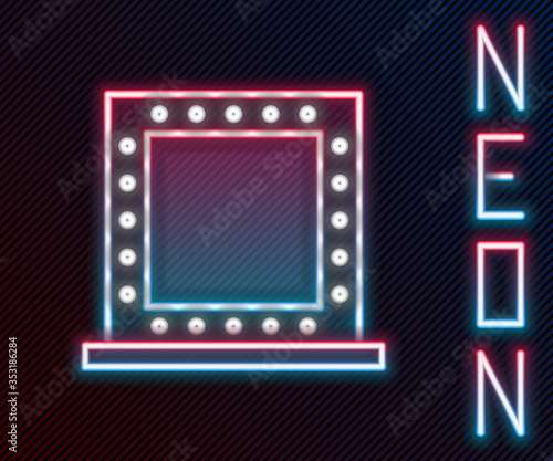 Glowing neon line Makeup mirror with lights icon isolated on black background. Colorful outline concept. Vector Illustration.