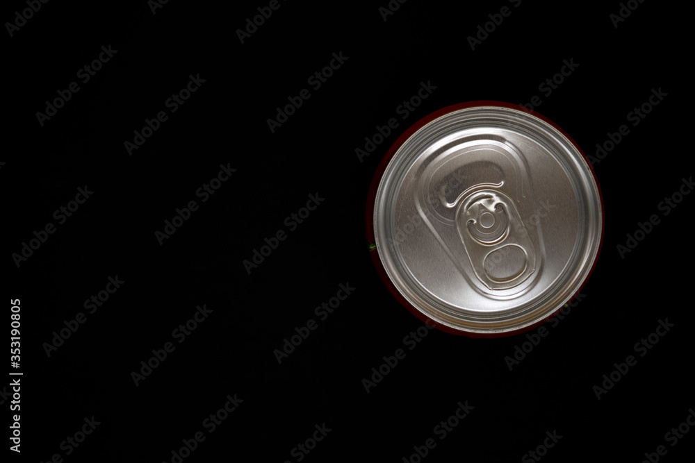 Can of soda from overhead view on a black background Can of soda from overhead view on a black background