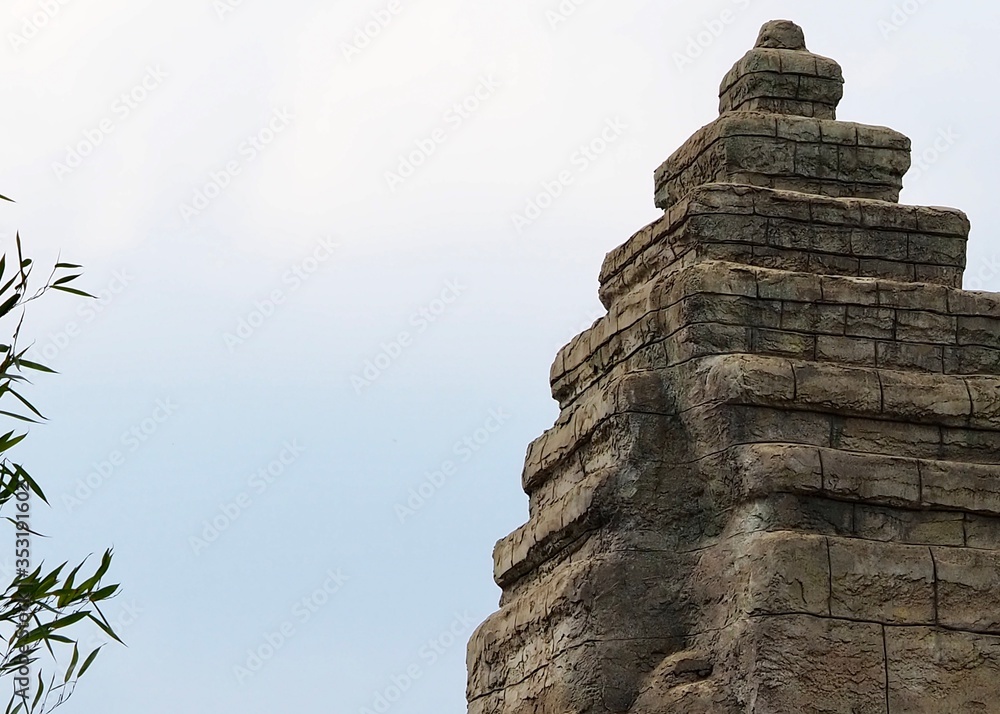Fototapeta premium Ancient eastern temple against blue sky 