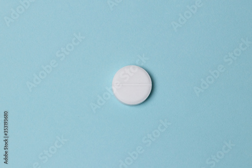  pills on  blue colored background. Medication and prescription pills web banner with copy space. 