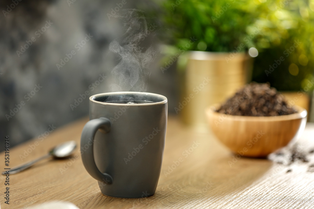 Hot tea on the table while relaxing with free space for an advertising product Hot tea on the table while relaxing with free space for an advertising product
