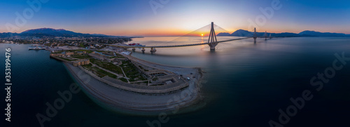Фотография Wide panorama of world famous  Rio - Antirio Harilaos Trikoupis bridge at sunset