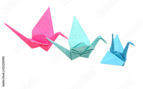 Fototapeta Naklejka Na Ścianę i Meble -  origami crane birds on white background