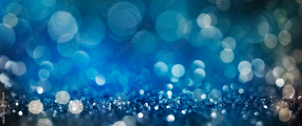 Christmas light background. Holiday glowing backdrop. Defocused Background With Blinking Stars. Blurred Bokeh. Christmas light background. Holiday glowing backdrop. Defocused Background With Blinking Stars. Blurred Bokeh.
