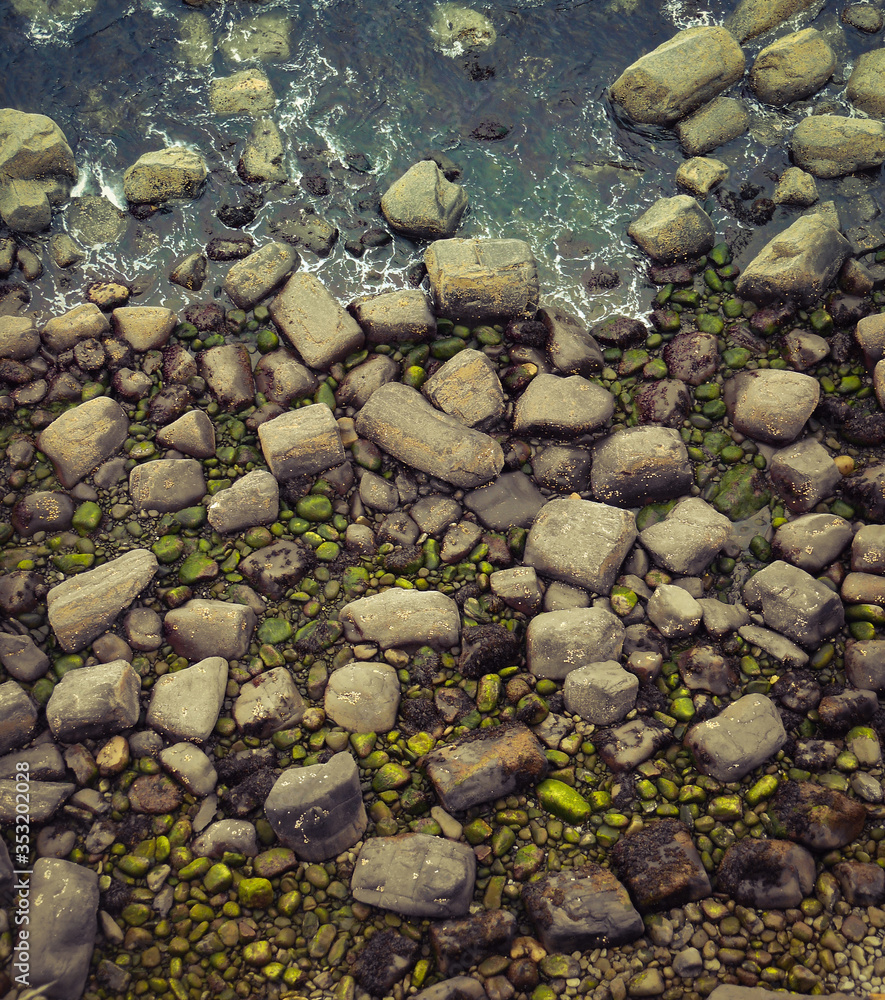 Close up of shoreline with water and rocks