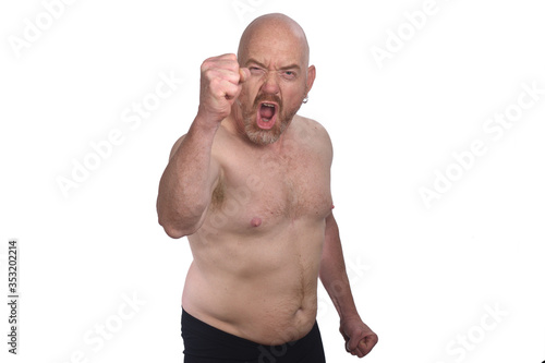 shirtless angry man on white background