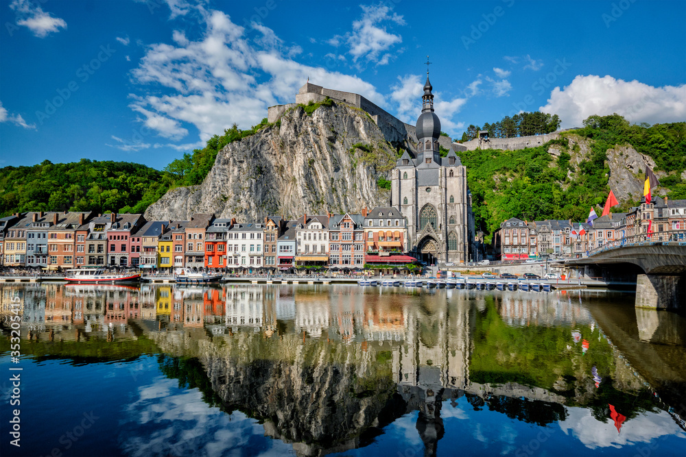 Obraz premium View of picturesque Dinant town, Dinant Citadel and Collegiate Church of Notre Dame de Dinant and Pont Charles de Gaulle bridge over the Meuse river. Belgian province of Namur, Blegium