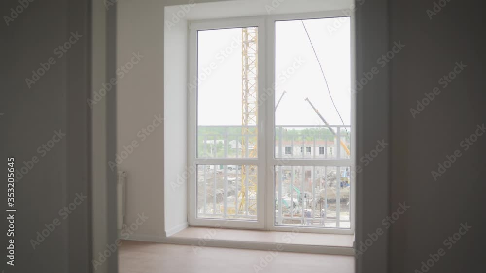 New apartment from the inside. Modern interior- sunlit empty room. New building, new apartment. New apartment from the inside. Modern interior- sunlit empty room. New building, new apartment.