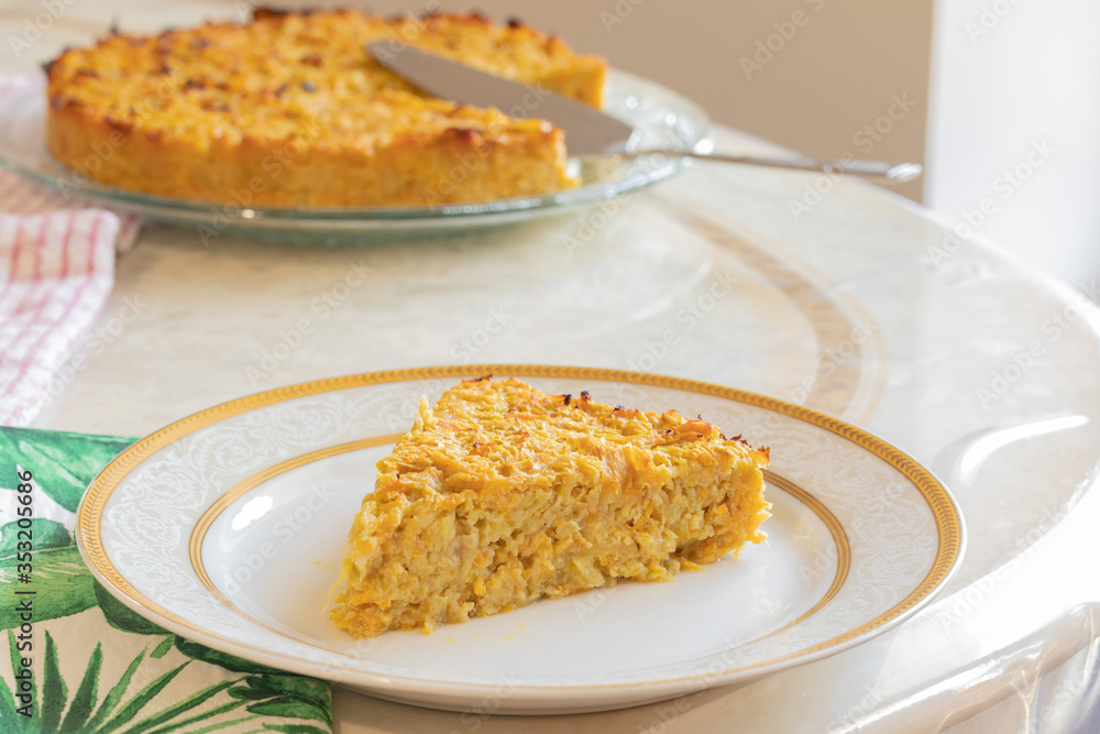 Homemade Roasted vegetable quiche pie with a wedge cut out. Delicious vegetarian food. freshly baked
Onions carrots squash courgettes KUGEL Homemade Roasted vegetable quiche pie with a wedge cut out. Delicious vegetarian food. freshly baked
Onions carrots squash courgettes KUGEL