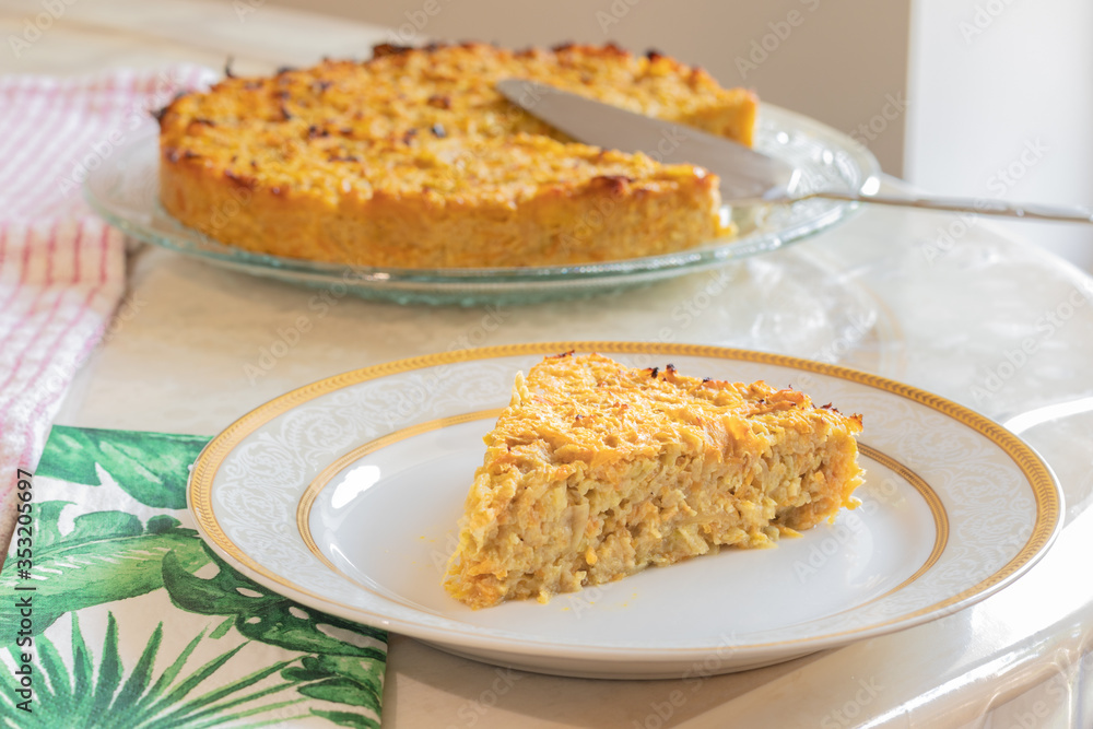 Homemade Roasted vegetable quiche pie with a wedge cut out. Delicious vegetarian food. freshly baked
Onions carrots squash courgettes KUGEL Homemade Roasted vegetable quiche pie with a wedge cut out. Delicious vegetarian food. freshly baked
Onions carrots squash courgettes KUGEL