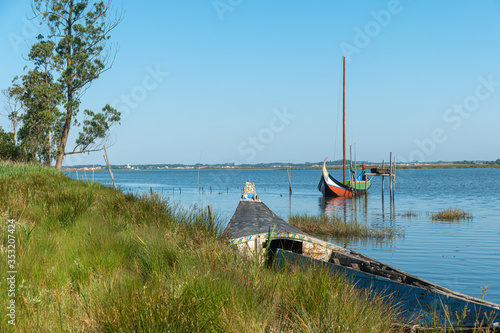 Moliceiro is the name given to the boats that circulate in the Ria de Aveiro, Portugal. These vessels were originally used for the collection of moliço, submerged aquatic vegetation collected for use.