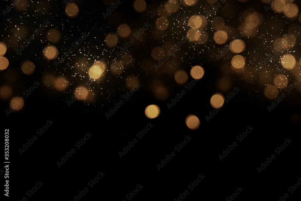 Obraz premium Bokeh light background. Holiday glowing backdrop. Defocused Background With Blinking Stars. Blurred Bokeh.
