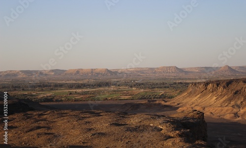 Arial view showing sunset at the top of the mountain at Bahariya oasis