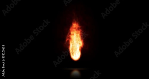 Real Flame of fire burning, isolated in the dark and reflecting off the floor. It may be a torch lit in the night. Abstract 4k animation photo