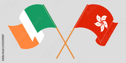Crossed and waving flags of Hong Kong and Ireland