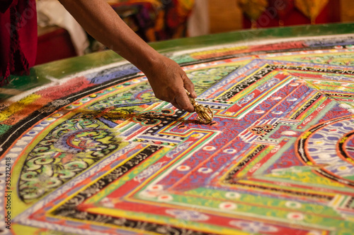 A colourful tibetan mandala in a Buddhist monastery photo