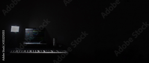 Fotografi Home studio recording for audio mixing, sound design and music production with a empty space on a black background