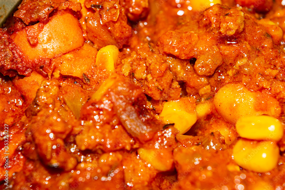 Quesadilla filling with ground beef, sausage, red beans, sweet corn, onion and tomato sauce. A traditional Mexican dish. Close up. Quesadilla filling with ground beef, sausage, red beans, sweet corn, onion and tomato sauce. A traditional Mexican dish. Close up.