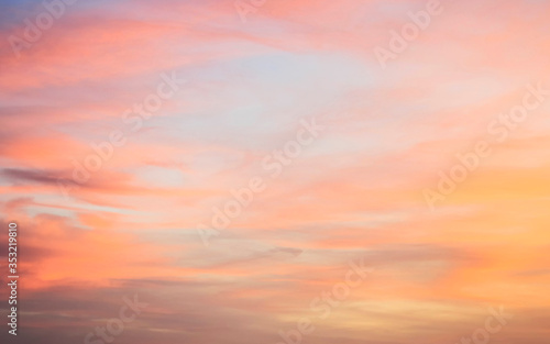 Beautiful sunset sky above clouds with dramatic light. © Vladimir