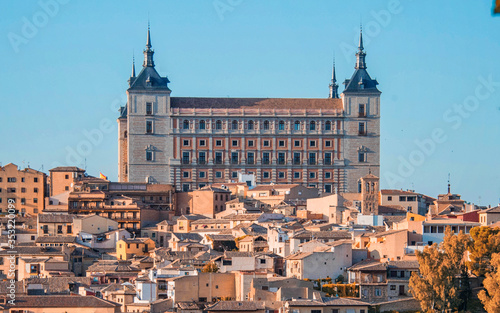 Toledo, Spain. Twilight view of ancient city Toledo in Castilla la Mancha with Santa Iglesia Catedral and Alcazar, landmark of Spain.