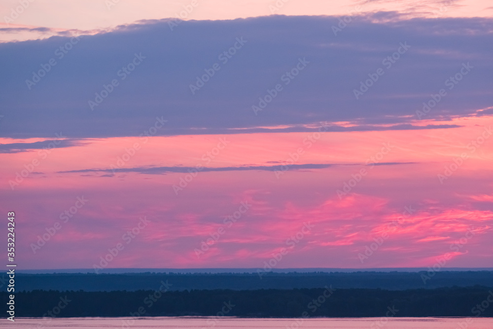 Beautiful sunrise sky with clouds and early sun. Structure and texture. Sunset. Nature landscape at the morning. Meditation and relaxation. Abstract background and horizon.