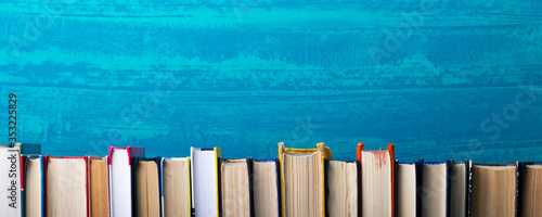 Books on wooden desk table and abstract background. Education background. Copy Space. Back to school.