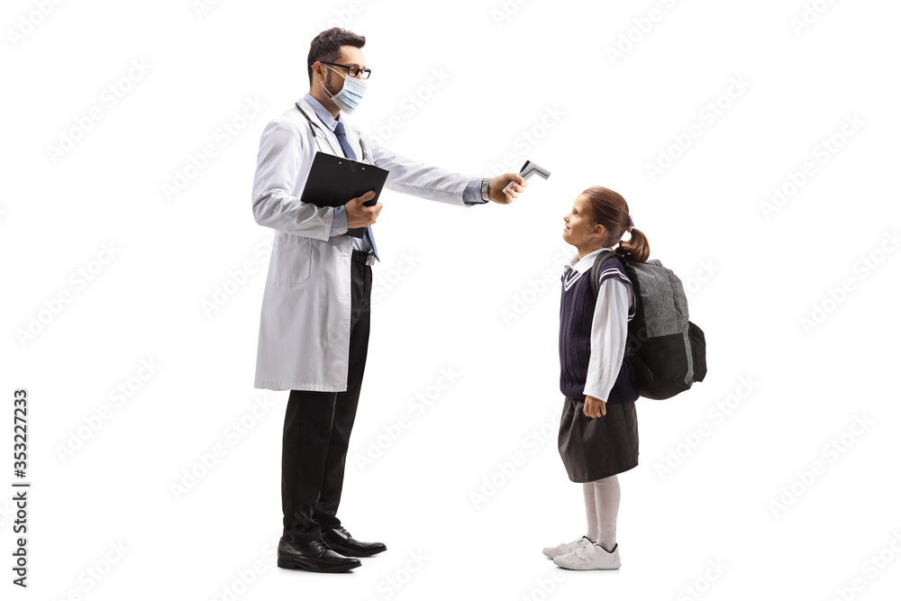 Male doctor with a thermometer measuring a temperature to a schoolgirl Male doctor with a thermometer measuring a temperature to a schoolgirl