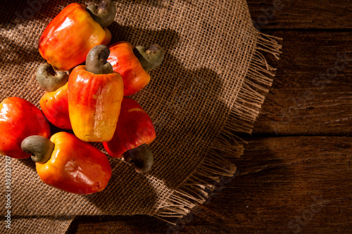 Obraz na płótnie cashew fruit over a wooden surface. w salonie