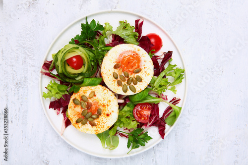 Fried eggs with pumpkin seeds. The concept of a healthy Breakfast. Copy of the space.