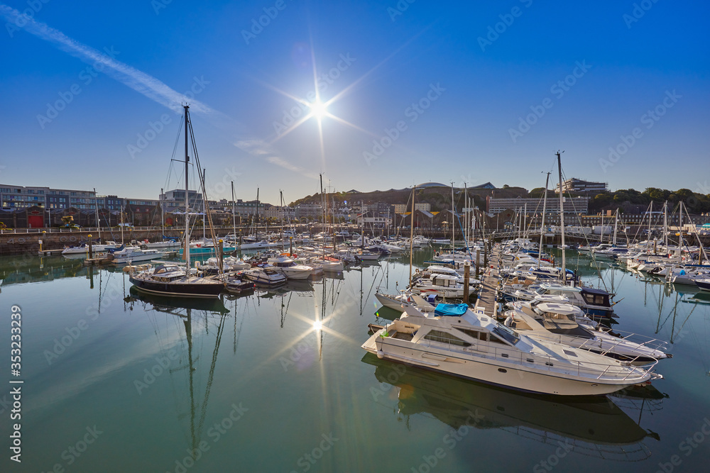 Image of St Helier Marina North section from the West Marina wall, early morning with blue skys and sunshine. Jersey, Channel Islands, UK