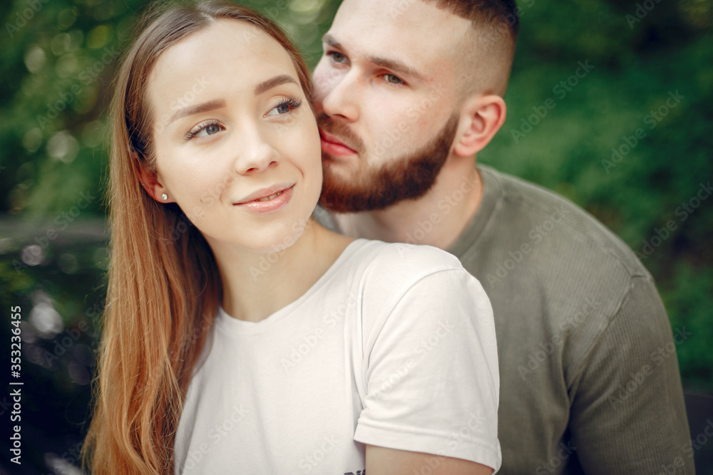 Couple in a forest. Man in a green t-shirt Couple in a forest. Man in a green t-shirt