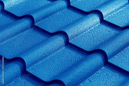 Metallic roof with drops of water.