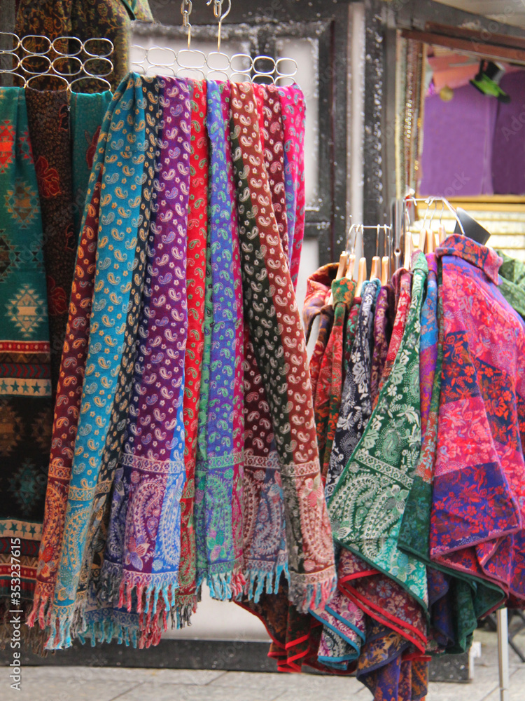 A Display of Brightly Coloured Soft Scarves.