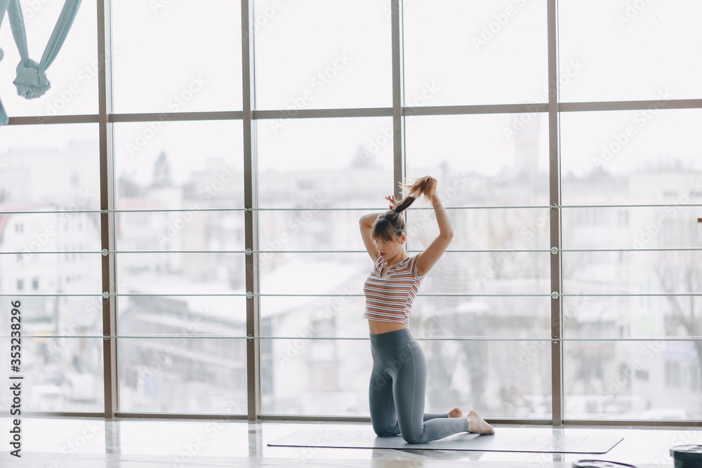 girl practice yoga, sports and healthy lifestyles, the concept of mental balance