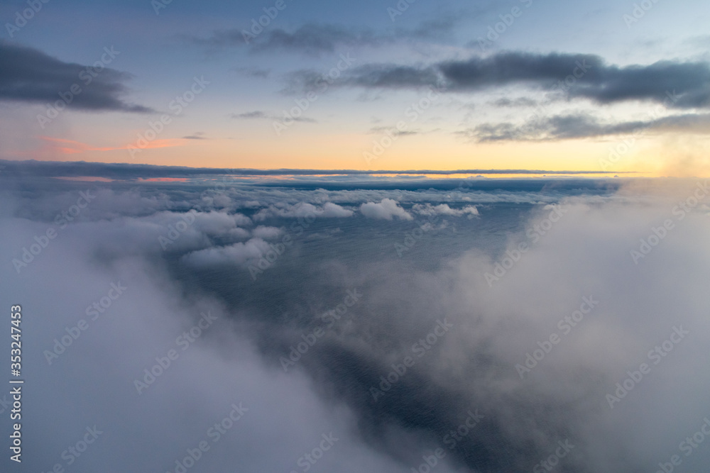 View of the ocean above the clouds from Miraduro do Cabo Girao in Madeira