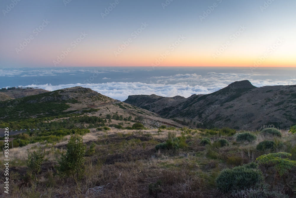 Panorama of clouds over the atlantic from Pico do Ruivo peak at Sunset in Madeira, Portugal Panorama of clouds over the atlantic from Pico do Ruivo peak at Sunset in Madeira, Portugal