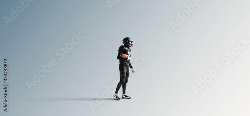 Black silhouette of a male american football player on a uniform background
