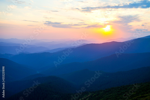 Sunset in mountains. © Ivan