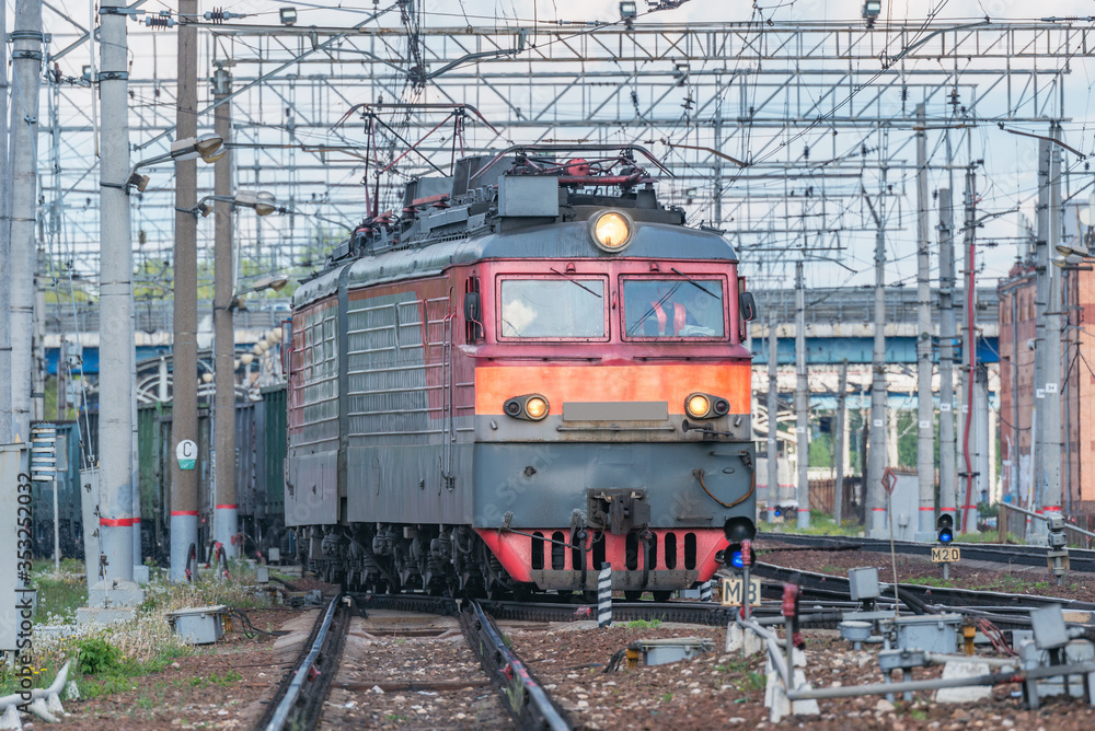 Freight train arrives to the station. Russia.