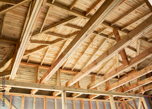The roof is made of wooden boards. Lumber construction work