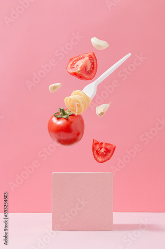 Фотография Pasta ingridients in free fall
