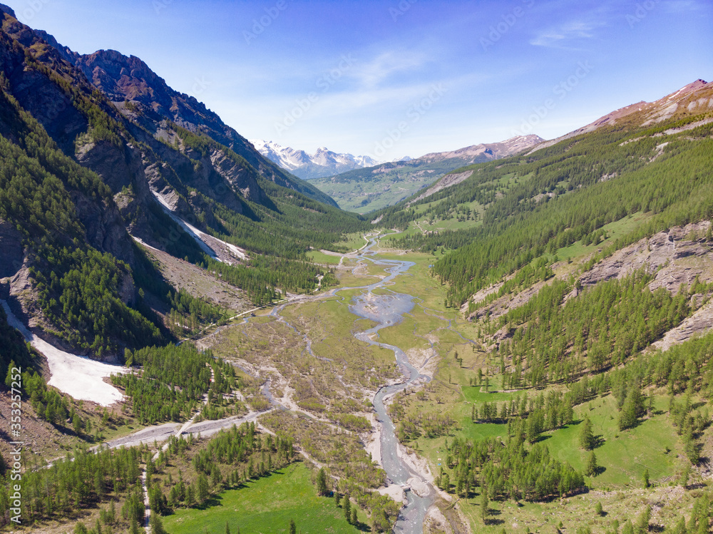Naklejka premium alps mountains piedmont valley flight in a sunny day. aerial view
