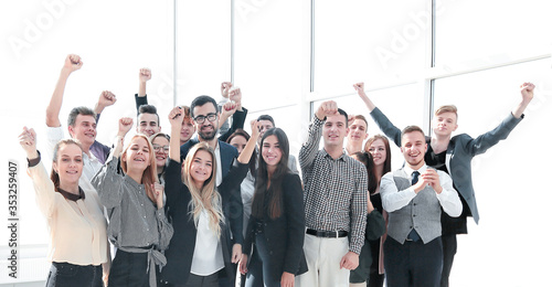 Obraz na plátně group of ambitious young people standing in a new office