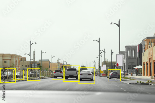 City road with scanner frames on cars outdoors, view from automobile. Machine learning
